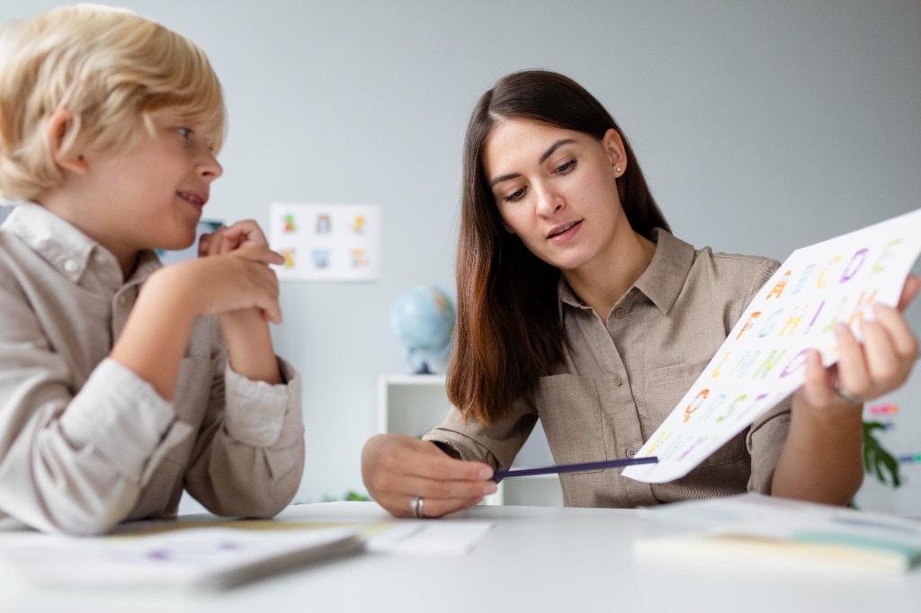 Private tutor working one-to-one with a child